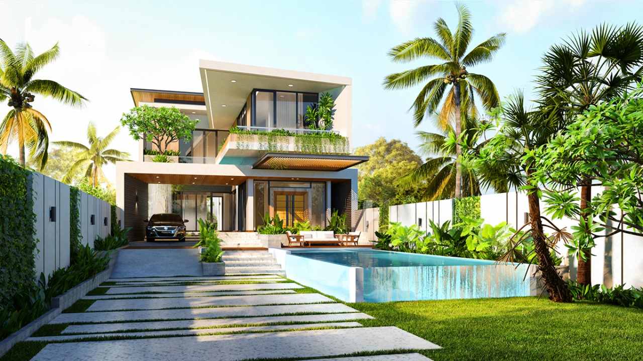 Cần Bao Nhiêu Tiền Để Xây Nhà 2 Tầng? Câu Trả Lời Rõ Ràng Từng Bước Biệt thự 2 tầng sân vườn có hồ bơi và lối vào lát đá giữa không gian nhiệt đới