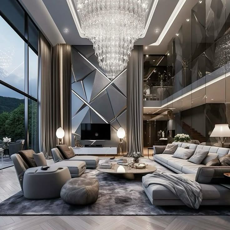 Nội thất villa hiện đại với phòng khách trần cao, sofa xám và đèn chùm pha lê