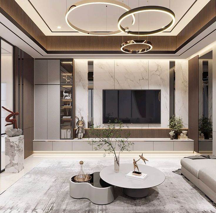 Thiết Kế Nhà Phố Tiện Nghi: 2 Tầng, Có Gara, Tối Ưu Diện Tích Phòng khách nhà phố tiện nghi với nội thất hiện đại và kệ tivi ốp đá sang trọng