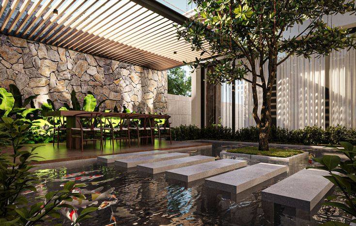 Thiết Kế Sân Vườn Ở Bảo Lộc - Kinh Nghiệm Giúp Tiết Kiệm Và Đẹp Bền Hồ cá sân vườn với lối đi đá nổi phong cách nhiệt đới tại Bảo Lộc